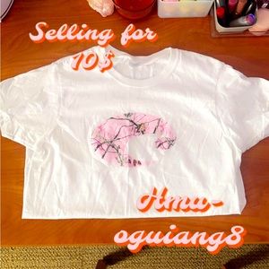Cool white tee with gilder logo printed in pink camo single stitch
